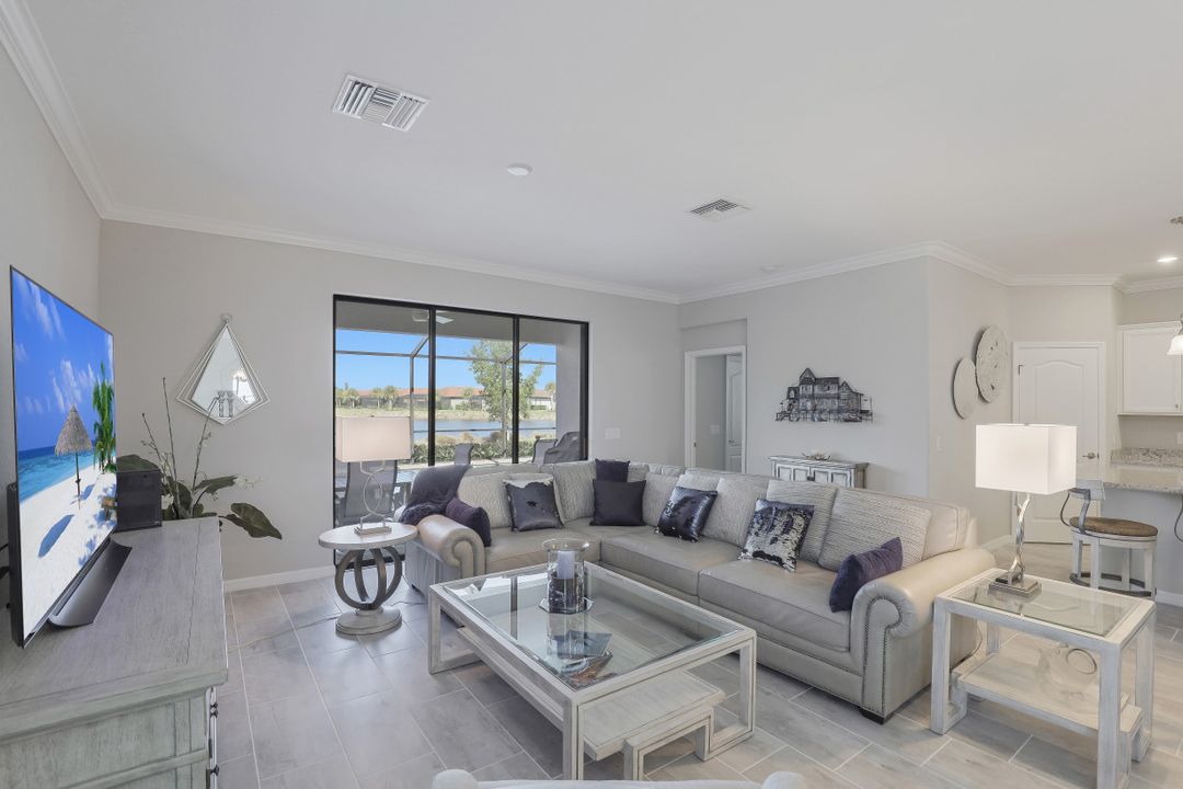 1493 Artesia Dr W, Naples, FL 34113