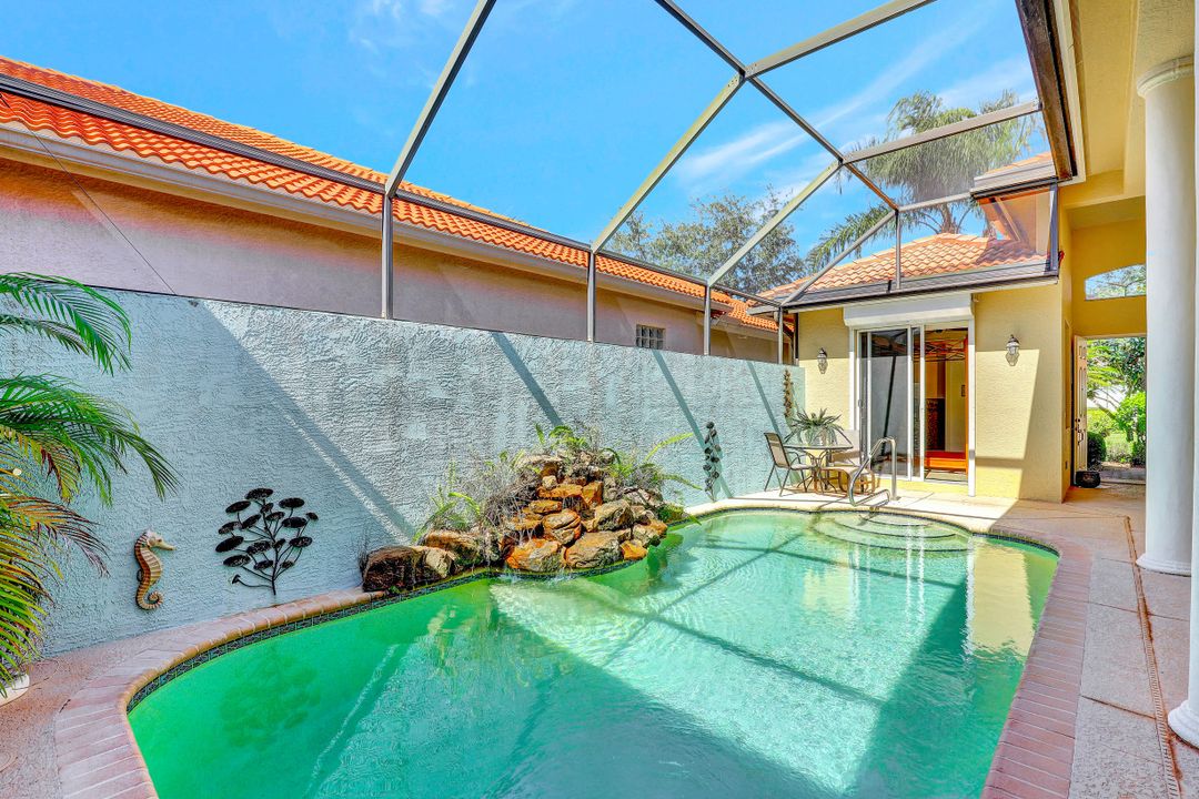 112 April Sound Dr, Naples, FL 34119