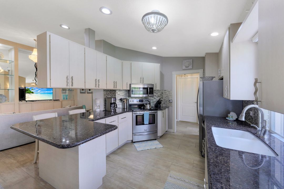 3551 El Verdado Ct, Naples, FL 34109