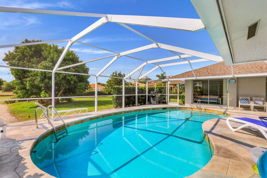 911 Tulip Ct, Marco Island, FL 34145