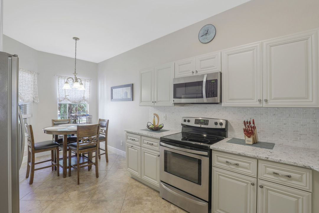 7782 Berkshire Pines Dr, Naples, FL 34104