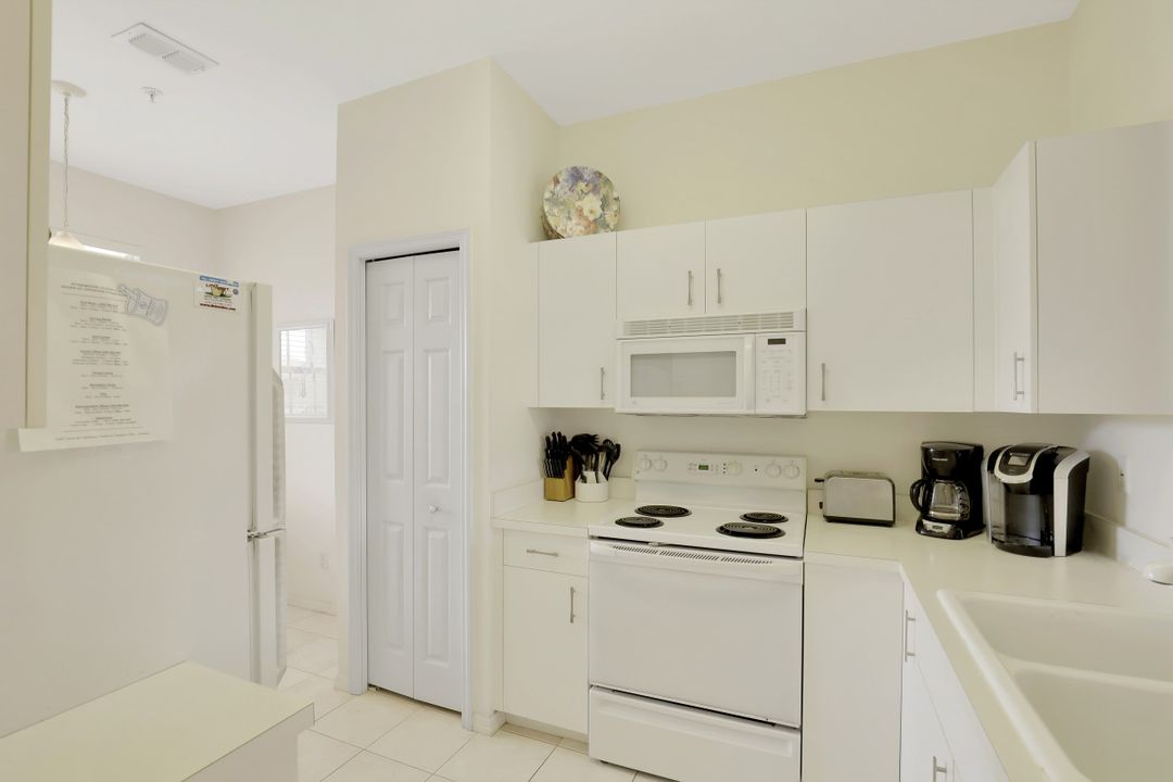 2310 Carrington Ct #202, Naples, FL 34109