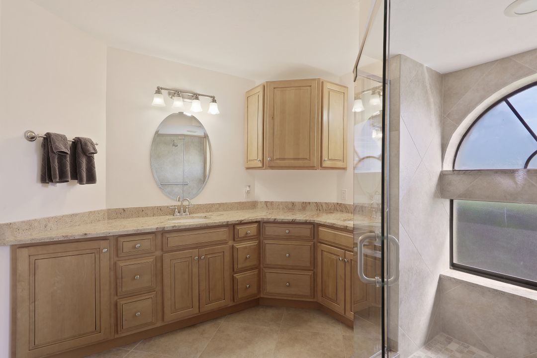 571 Beachwalk Cir #104, Naples, FL 34108