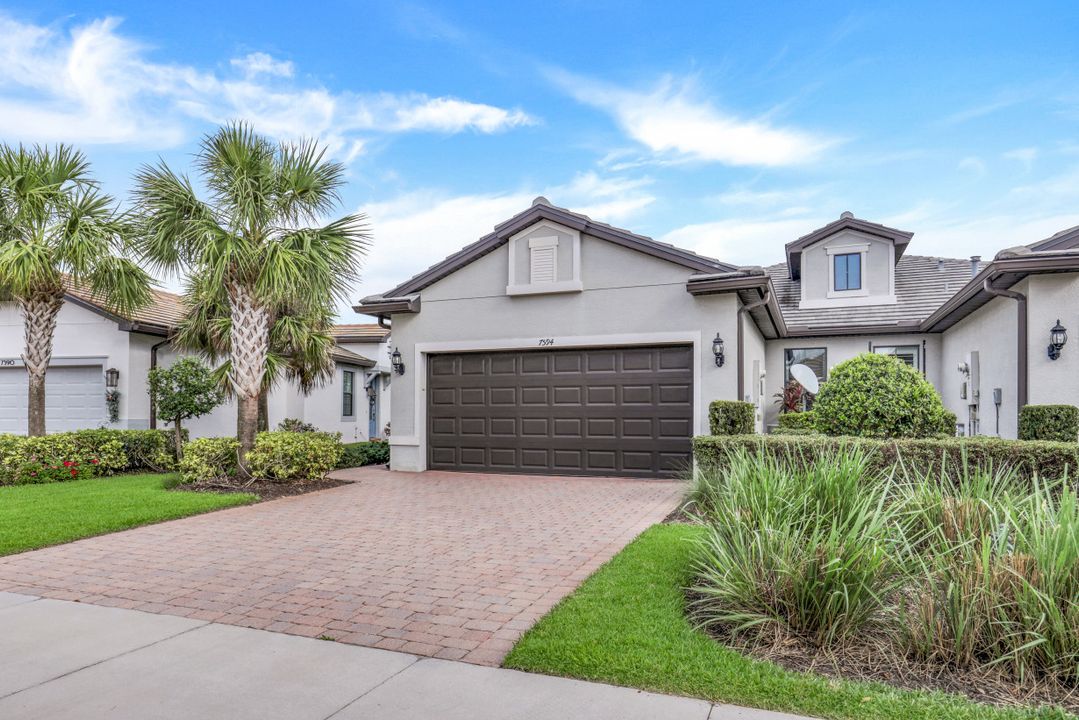 7594 Jacaranda Ln, Naples, FL 34114