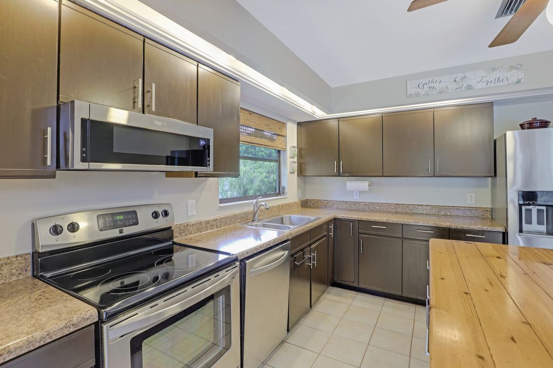 5890 Cypress Hollow Way, Naples, FL 34109