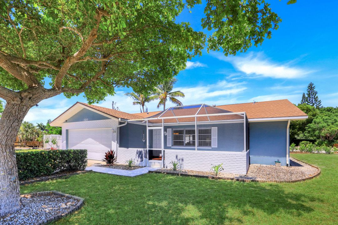 320 Marco Lake Dr, Marco Island, FL 34145