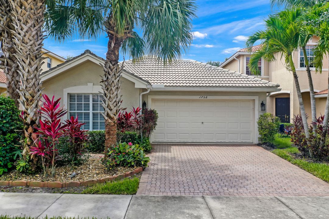 1758 Ribbon Fan Ln, Naples, FL 34119