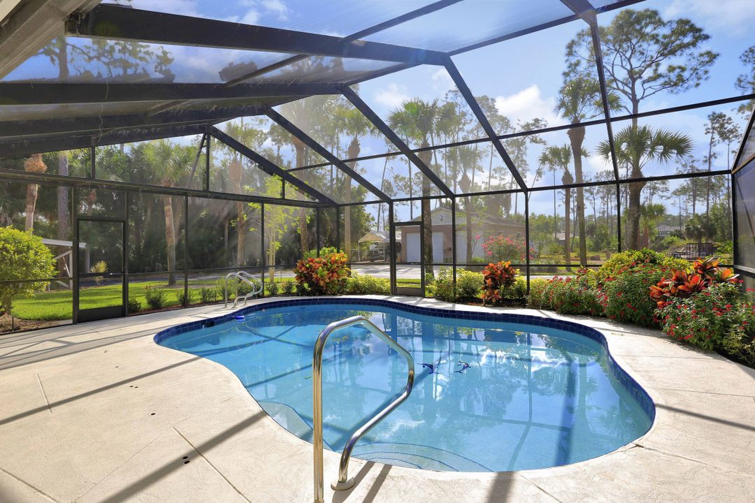 5980 Hidden Oaks Ln, Naples, FL 34119