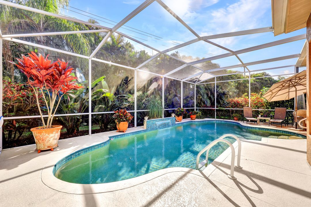 1753 Winding Oaks Way, Naples, FL 34109