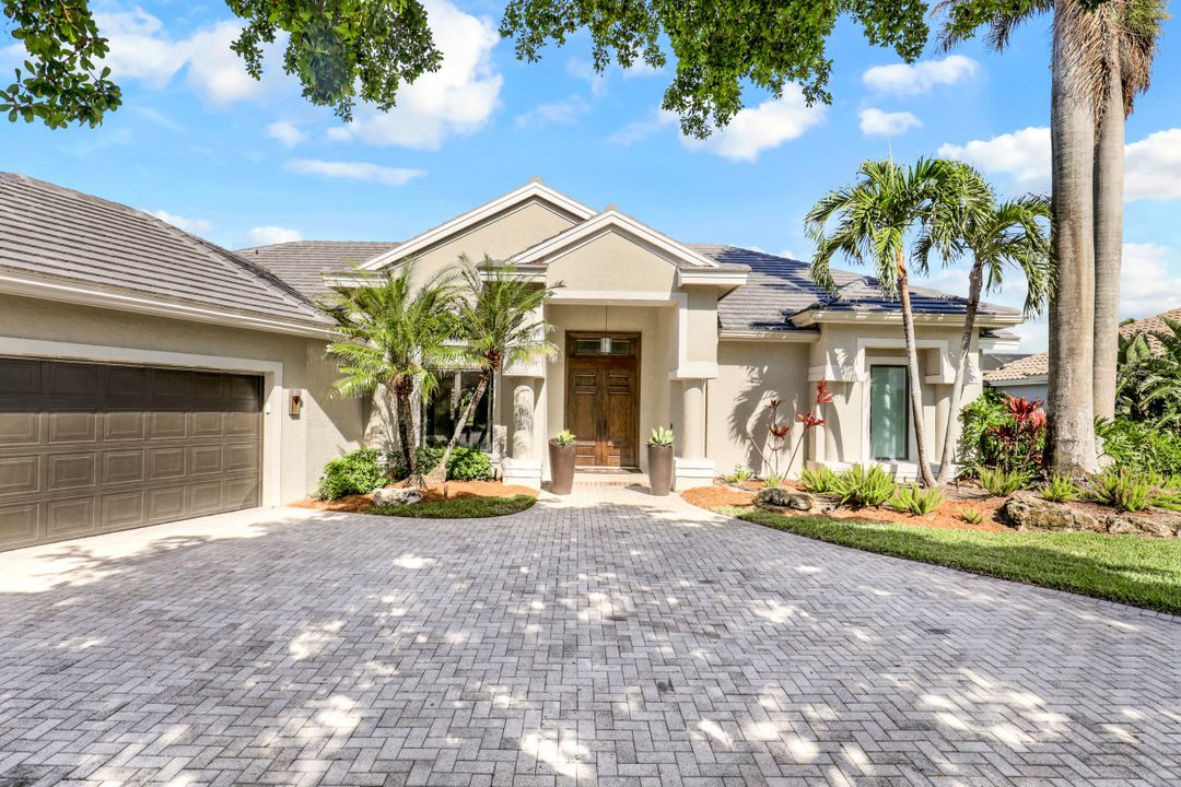 1034 Spanish Moss Trail, Naples, FL 34108