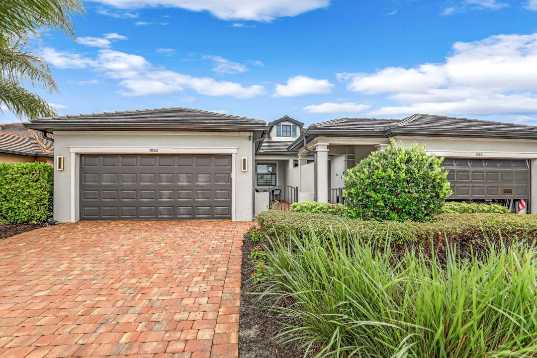 7682 Jacaranda Ln, Naples, FL 34114