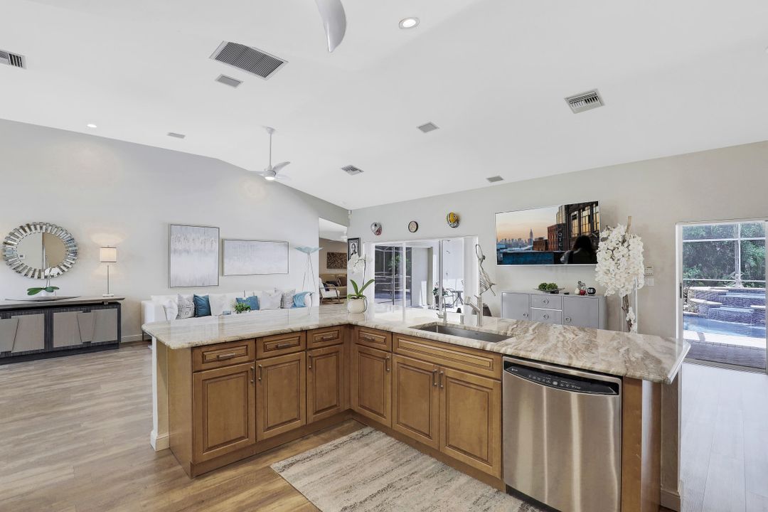 6080 Cypress Hollow Way, Naples, FL 34109