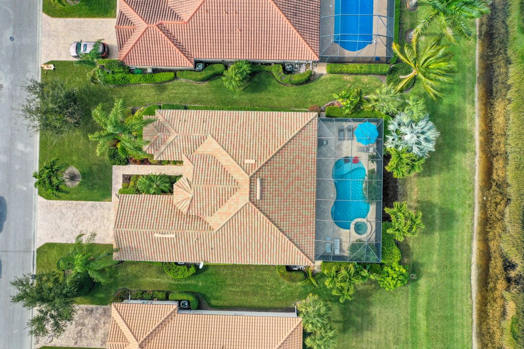 9403 Copper Rock Ct, Naples, FL 34120