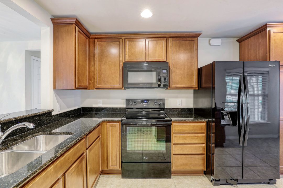 8458 Karina Ct, Naples, FL 34114