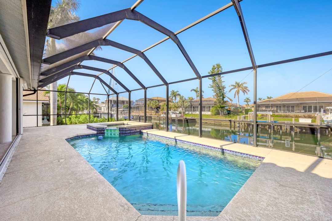 718 Nautilus Ct, Marco Island, FL 34145