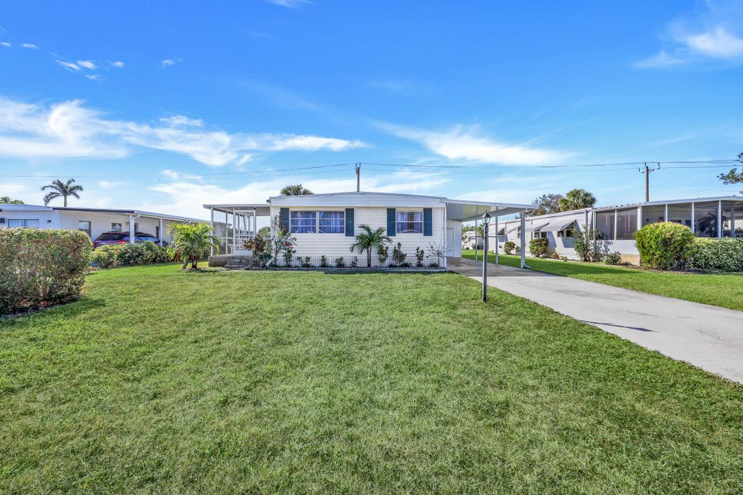 21 Lemans Dr, Naples, FL 34112