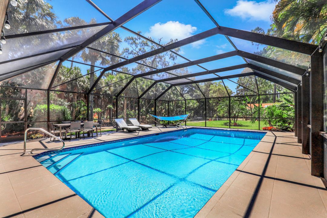 6060 Autumn Oaks Ln, Naples, FL 34119