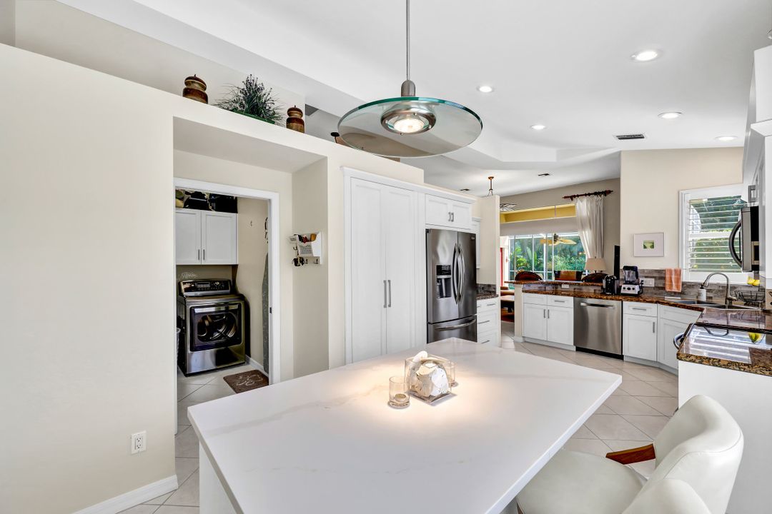 1753 Winding Oaks Way, Naples, FL 34109