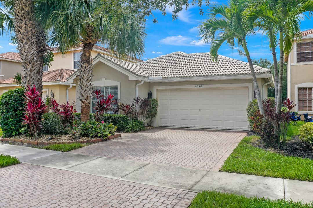 1758 Ribbon Fan Ln, Naples, FL 34119