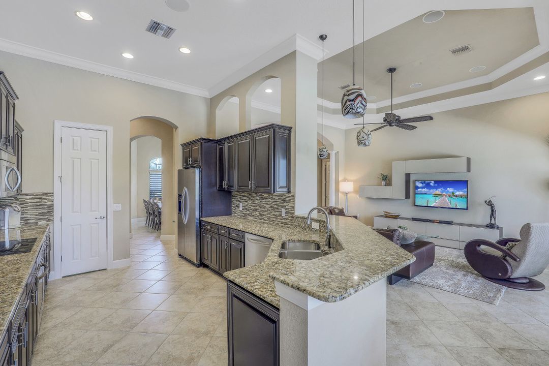 9403 Copper Rock Ct, Naples, FL 34120