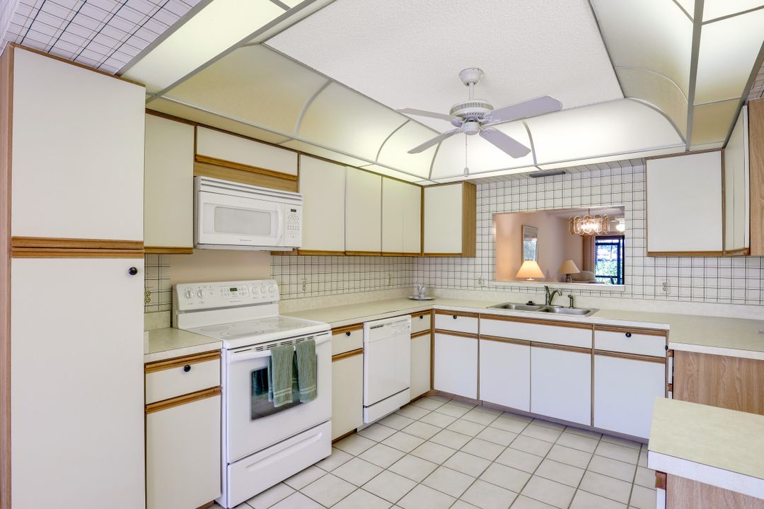 15330 Cedarwood Ln, Naples, FL 34110