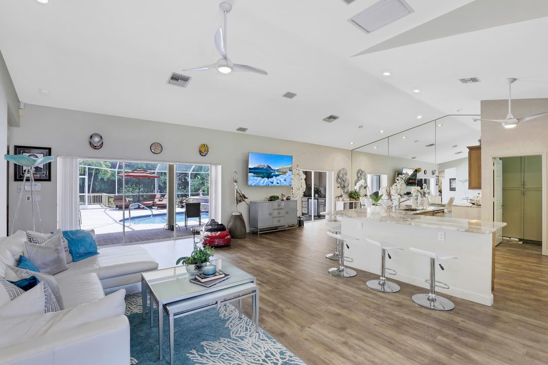 6080 Cypress Hollow Way, Naples, FL 34109