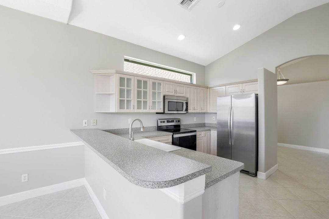 8039 Tauren Ct, Naples, FL 34119