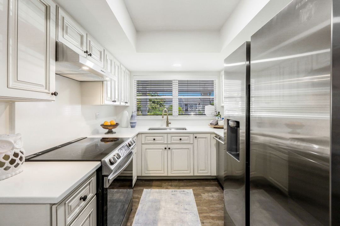 13 Watercolor Way, Naples, FL 34113