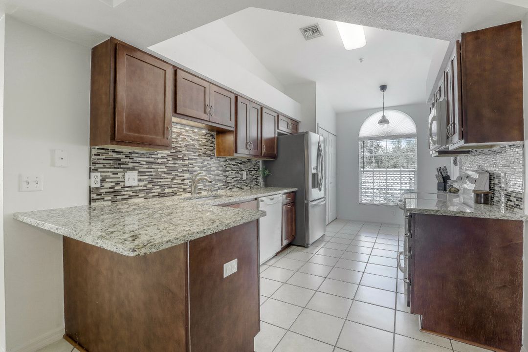 4910 Cougar Ct N #205, Naples, FL 34109