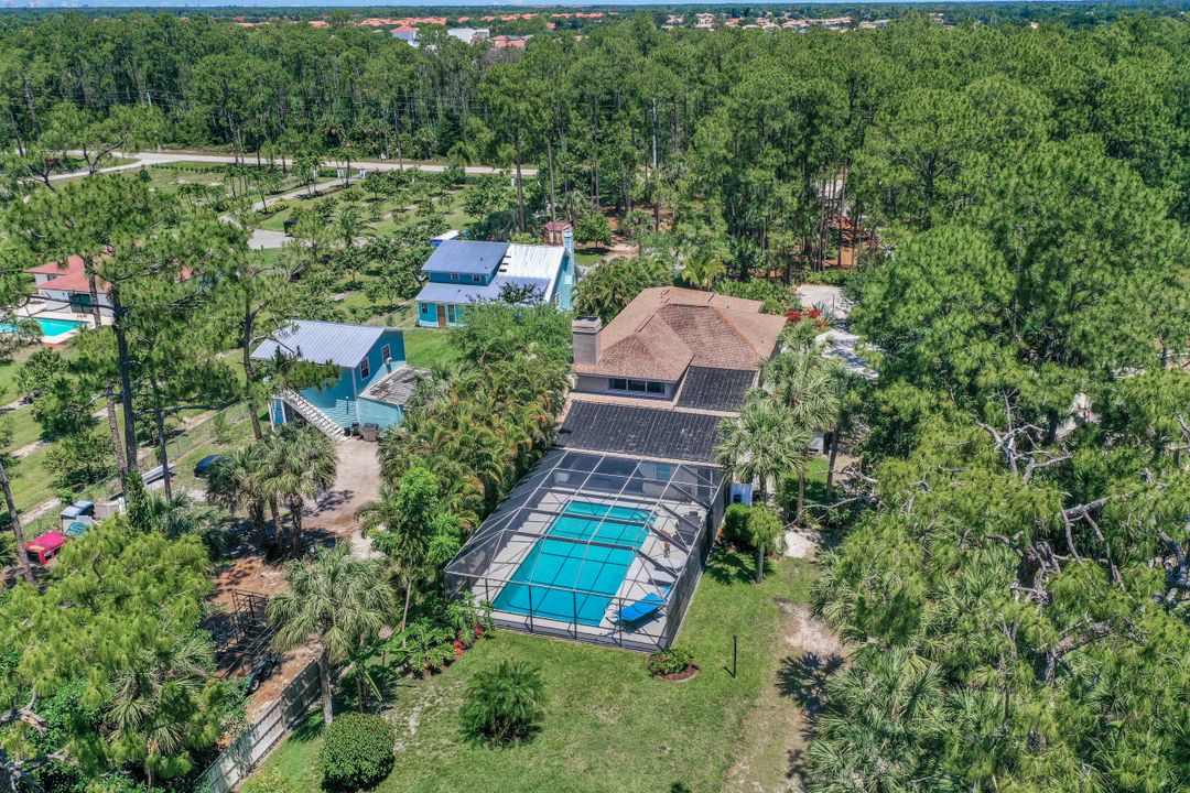 6060 Autumn Oaks Ln, Naples, FL 34119