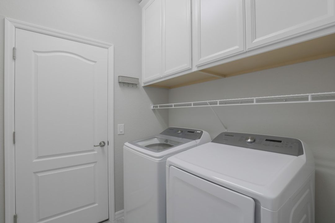 1493 Artesia Dr W, Naples, FL 34113