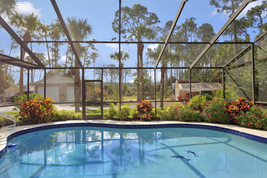 5980 Hidden Oaks Ln, Naples, FL 34119