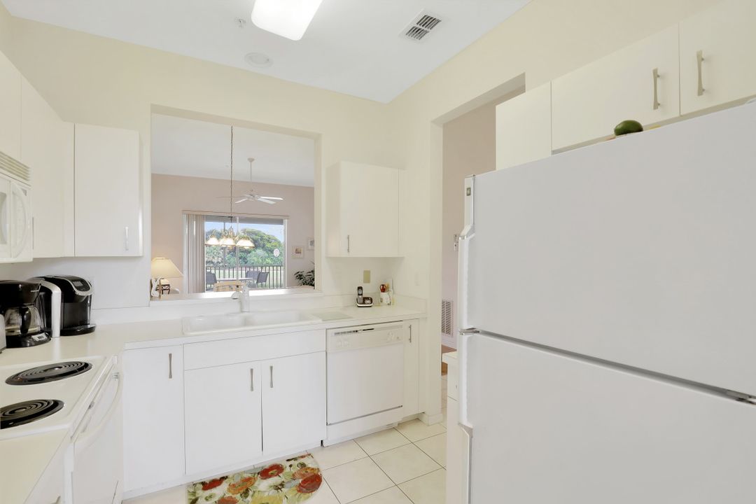 2310 Carrington Ct #202, Naples, FL 34109