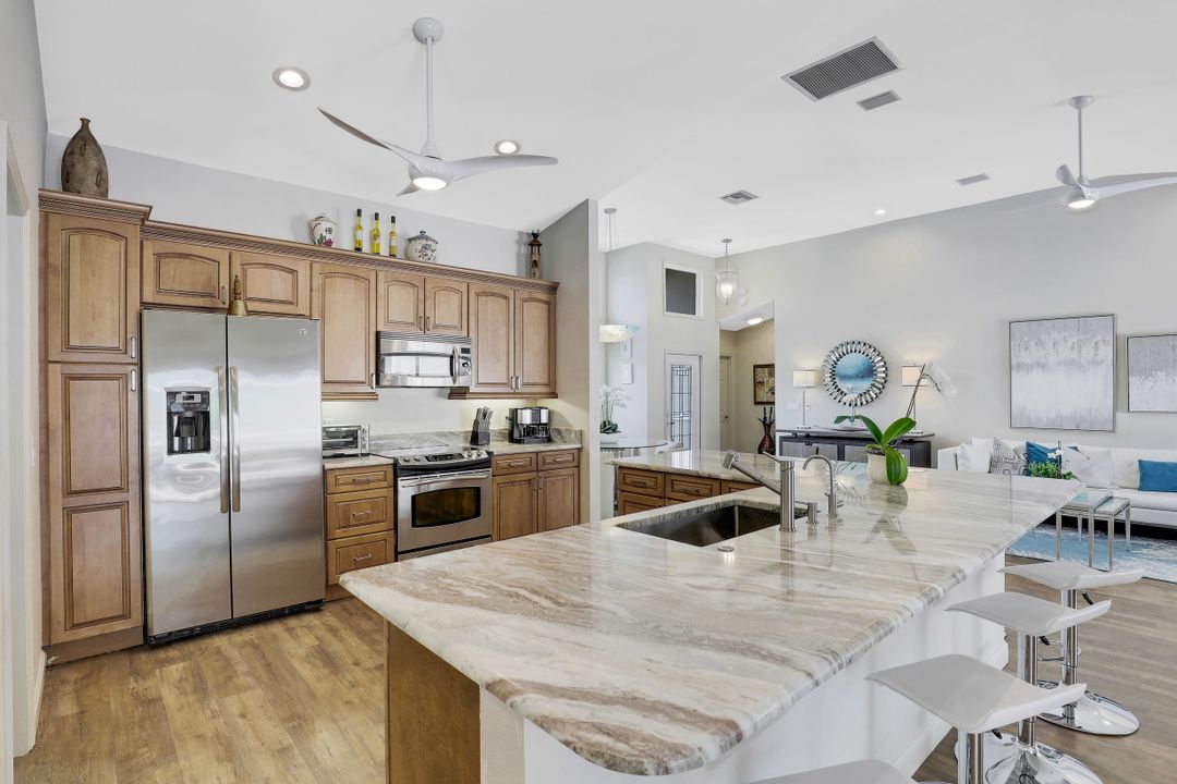 6080 Cypress Hollow Way, Naples, FL 34109