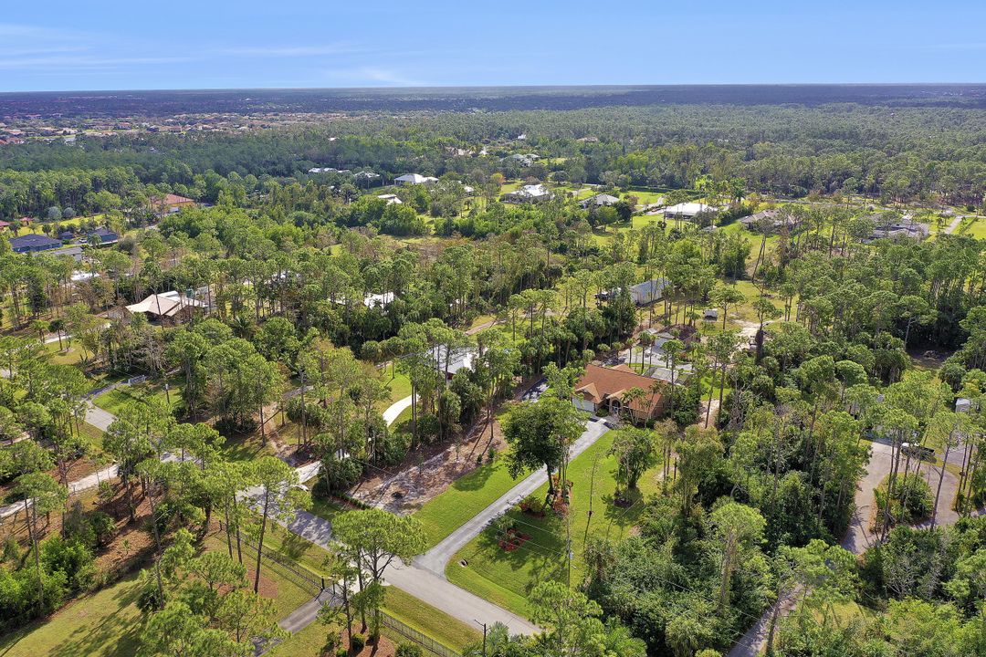 5980 Hidden Oaks Ln, Naples, FL 34119