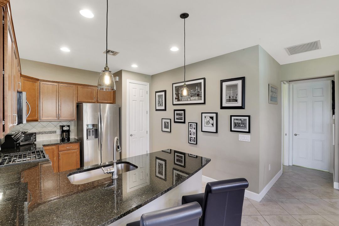 7594 Jacaranda Ln, Naples, FL 34114