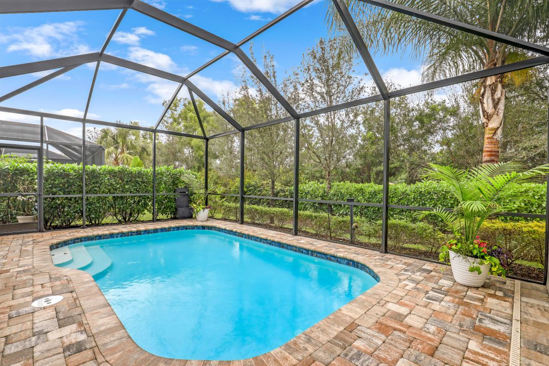 7682 Jacaranda Ln, Naples, FL 34114