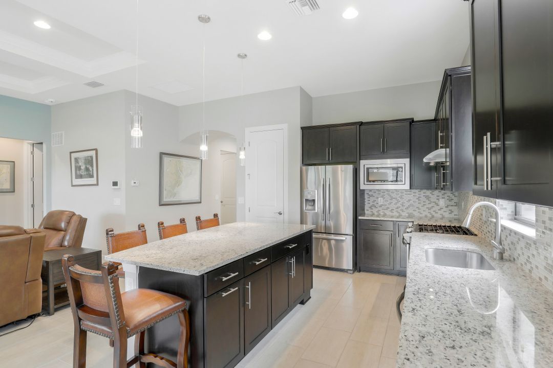 9419 Whooping Crane Wy, Naples, FL 34120