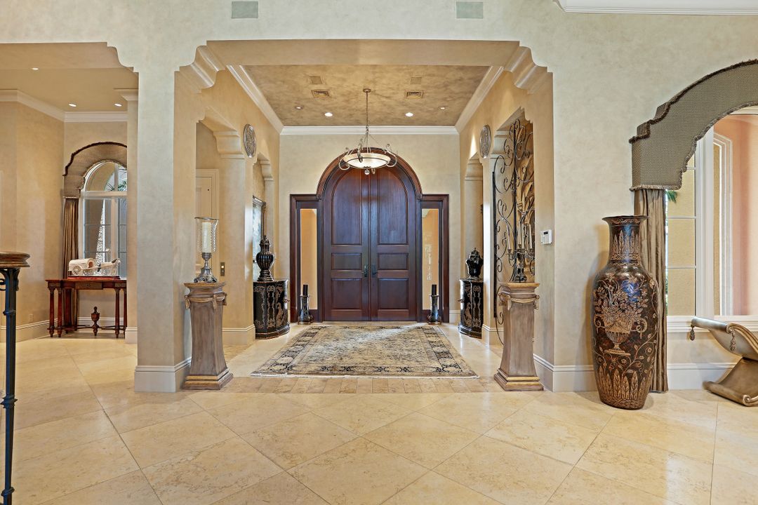 9779 Bent Grass Bend, Naples, FL 34108