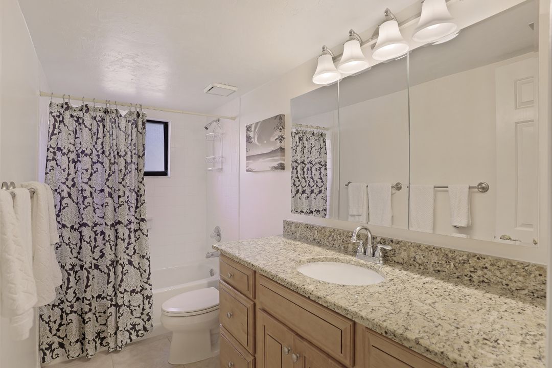 571 Beachwalk Cir #104, Naples, FL 34108