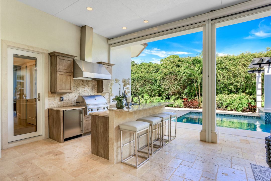 569 Neapolitan Way, Naples, FL 34103