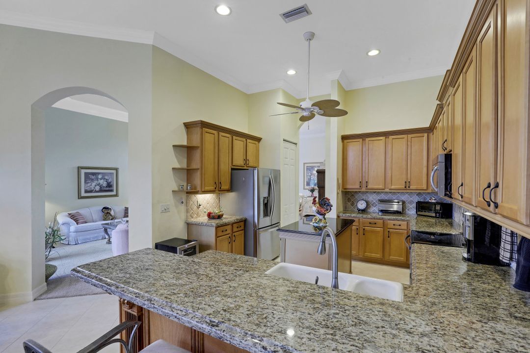 1427 King Sago Ct, Naples, FL 34119