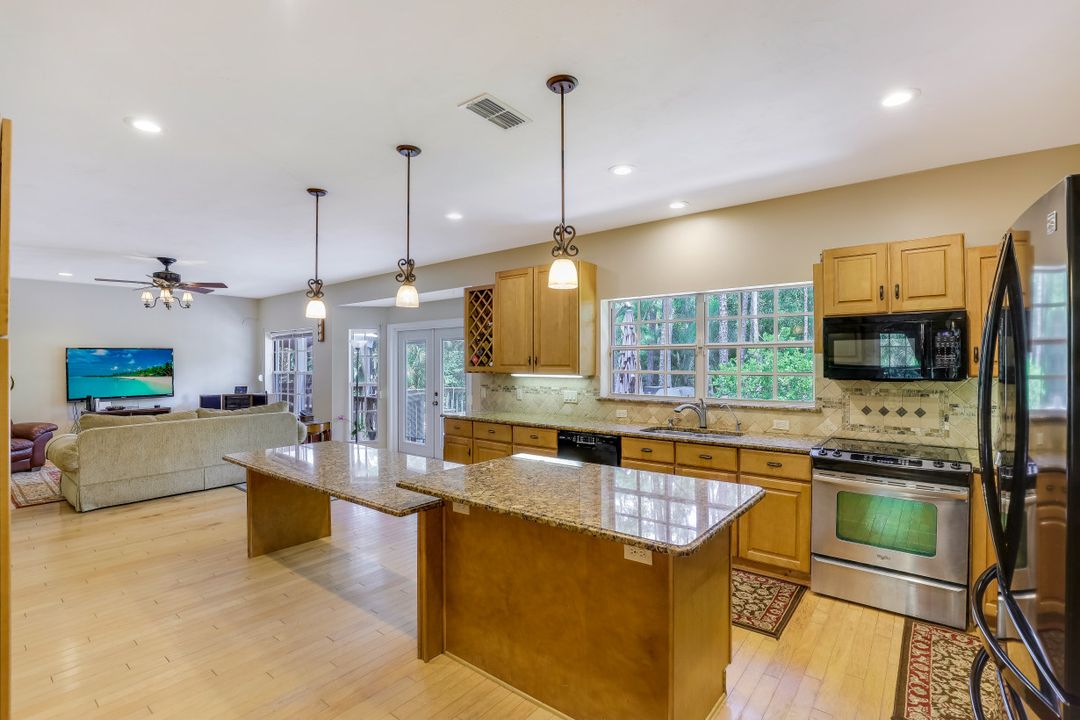 5700 Cypress Hollow Way, Naples, FL 34109