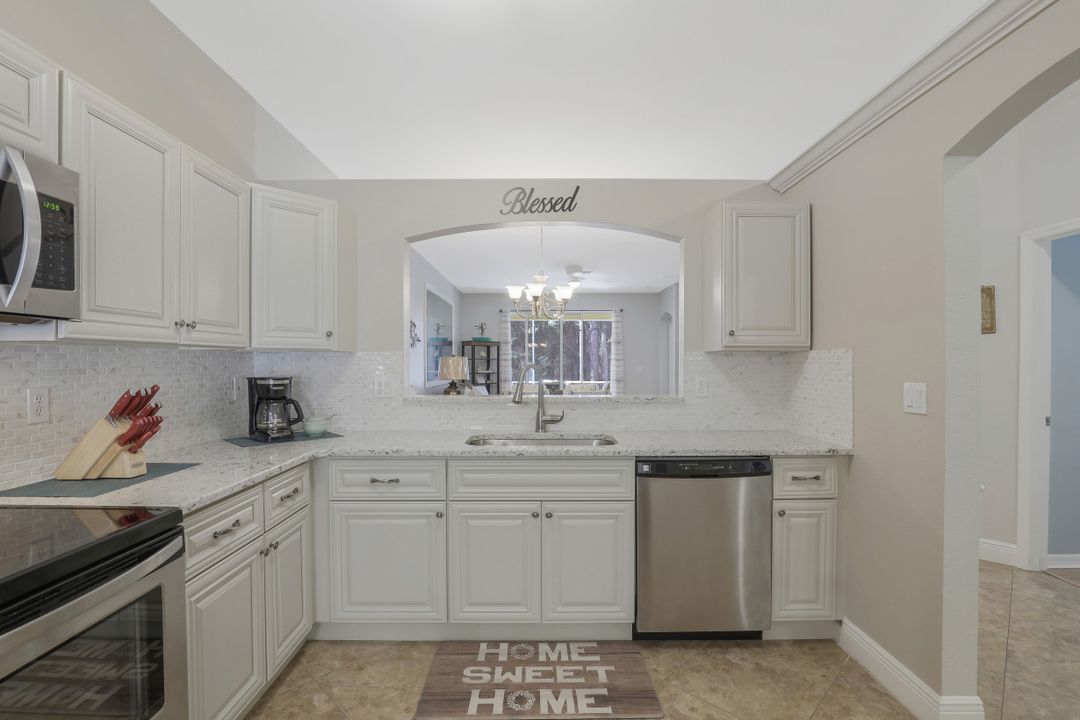 7782 Berkshire Pines Dr, Naples, FL 34104