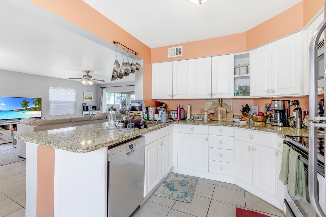 9589 Crescent Garden Dr #101, Naples, FL 34109