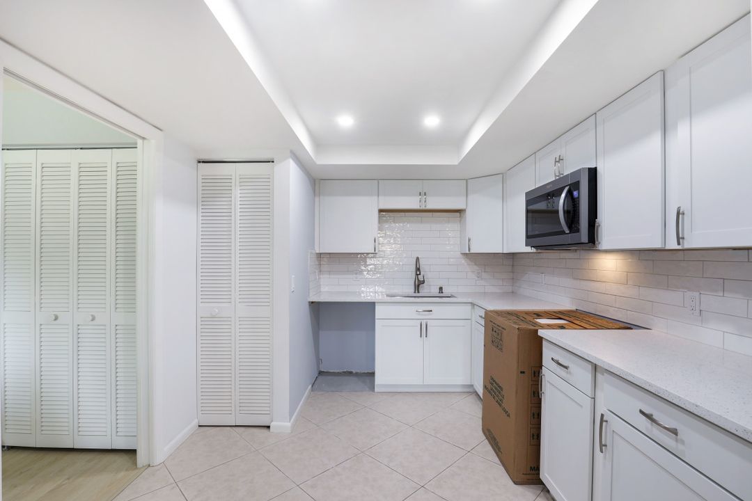 5954 Pelican Bay Blvd #222, Naples, FL 34108