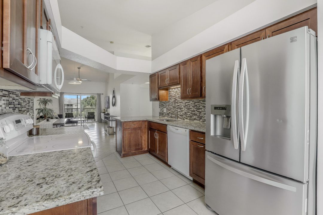 4910 Cougar Ct N #205, Naples, FL 34109