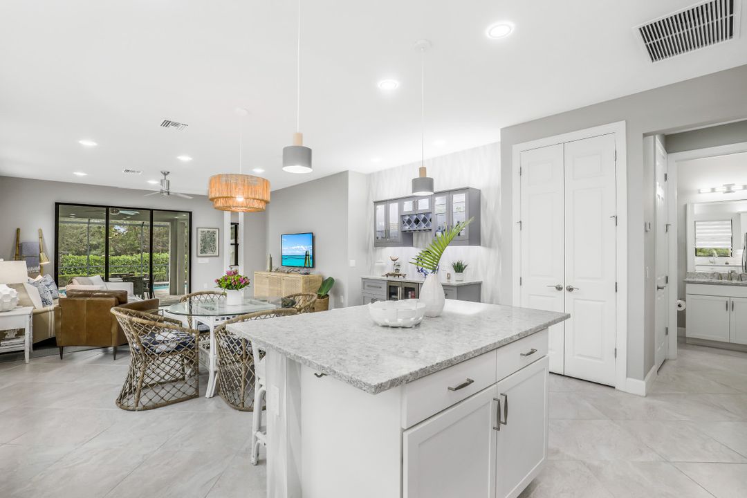 7682 Jacaranda Ln, Naples, FL 34114