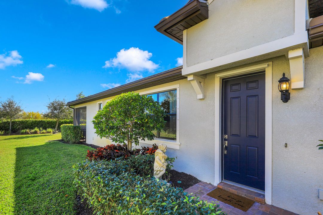 7594 Jacaranda Ln, Naples, FL 34114