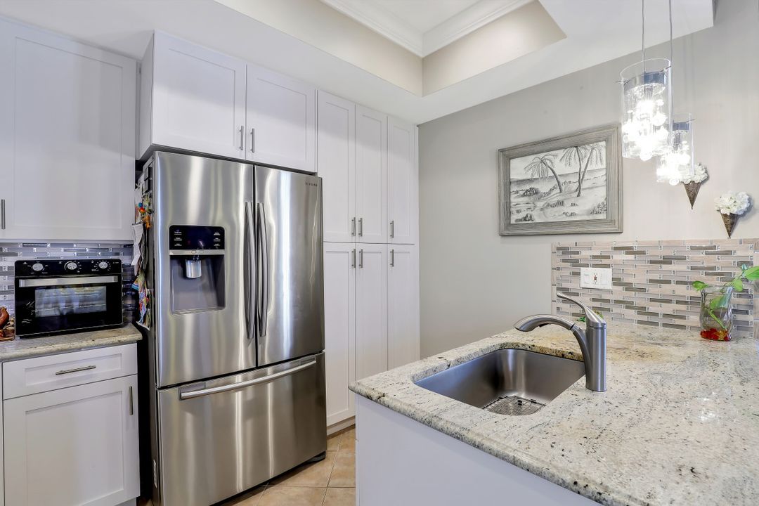 14927 Sterling Oaks Dr, Naples, FL 34110